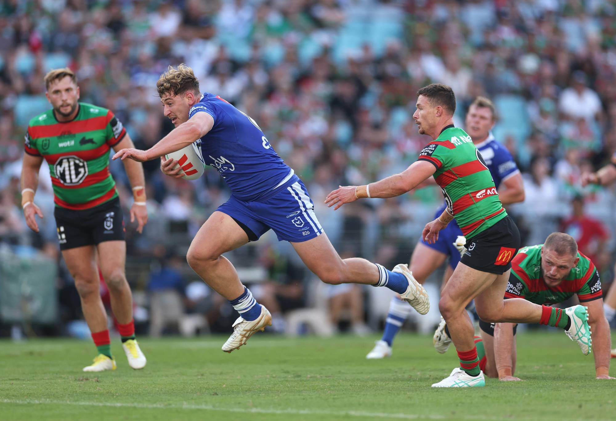 SYDNEY, AUSTRALIA - MARCH 29: Max King of the Bulldogs makes a break during the round four NRL match between South Sydney Rabbitohs and Canterbury Bulldogs at Accor Stadium, on March 29, 2024, in Sydney, Australia.