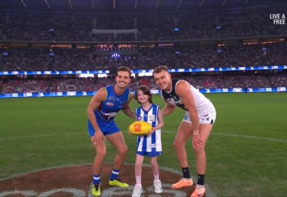 WATCH: 'Go Roos!' Brave young fan's heartwarming interaction with North skipper at the toss