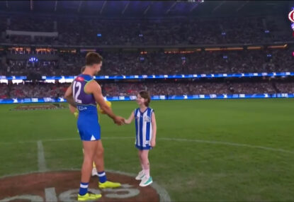 WATCH: 'Go Roos!' Brave young fan's heartwarming interaction with North skipper at the toss