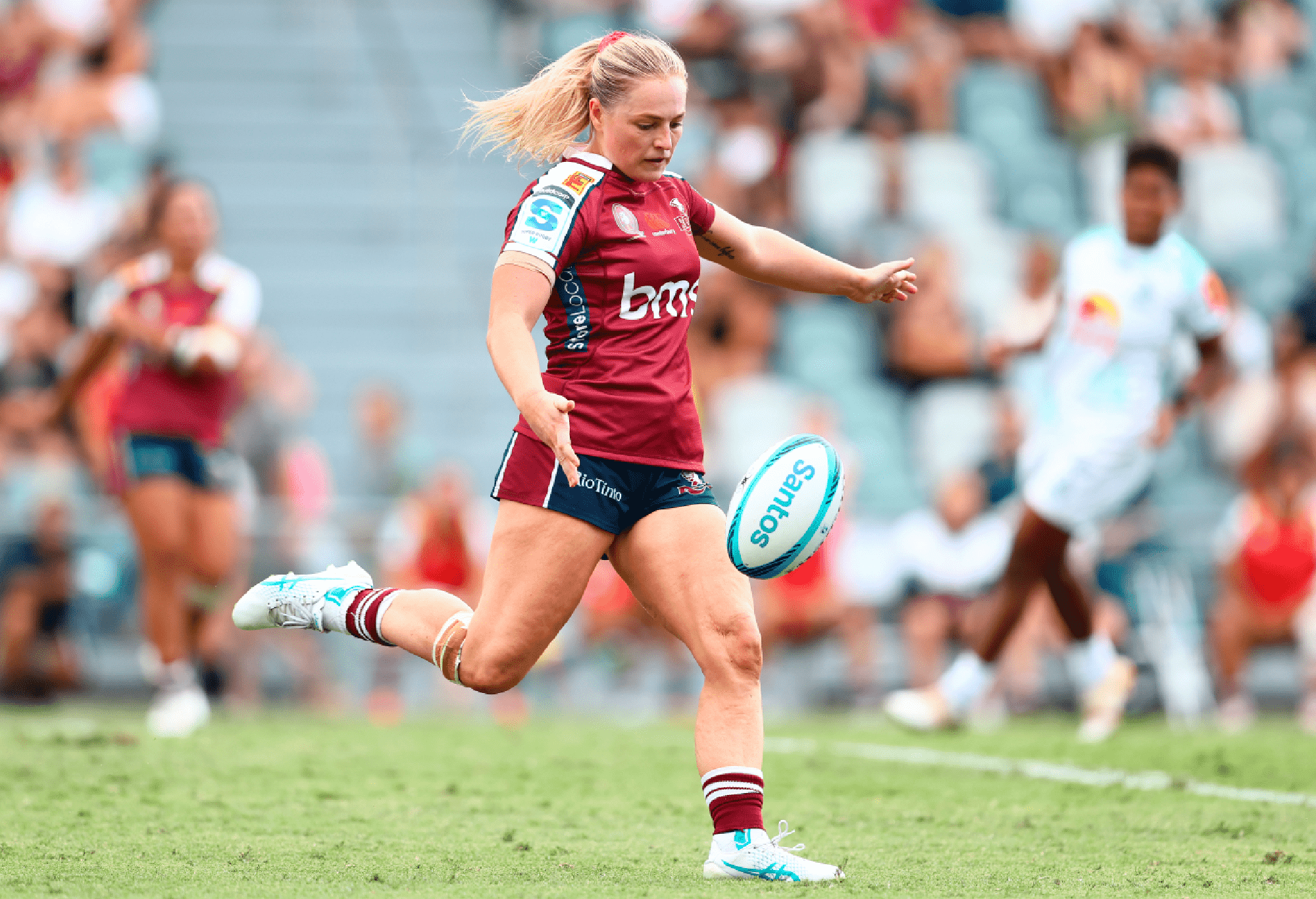Carys Dallinger of Reds kicks during the round one Super Rugby Women's match between Queensland Reds and Fijian Drua at Ballymore Stadium on March 17, 2024 in Brisbane, Australia. (Photo by Chris Hyde/Getty Images)