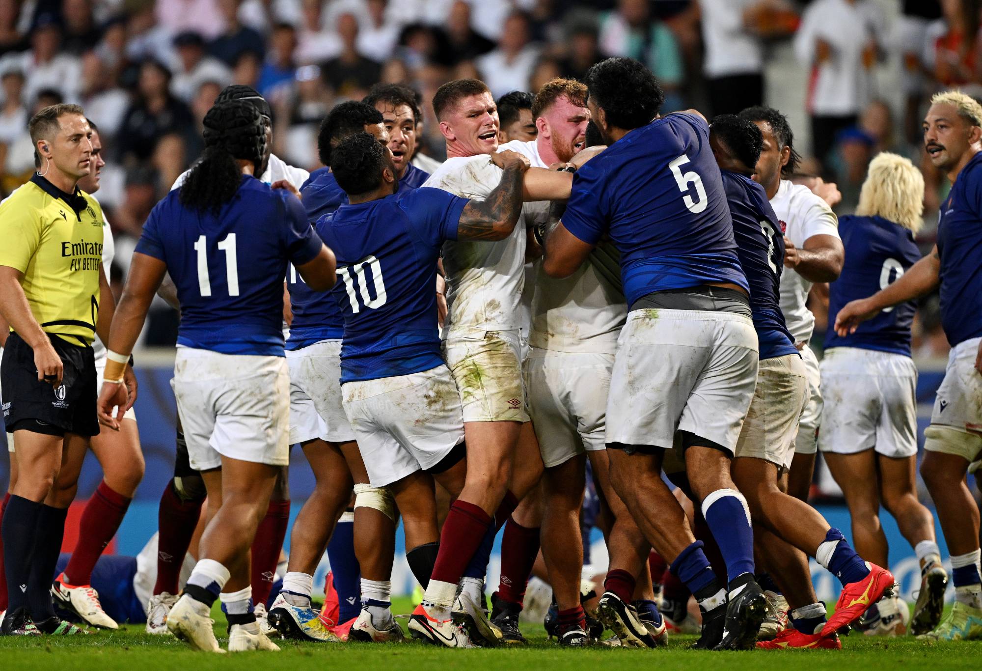 tempers flare between players of England and Samoa during the Rugby World Cup France 2023 match between England and Samoa at Stade Pierre Mauroy on October 07, 2023 in Lille, France. (Photo by Mike Hewitt/Getty Images)