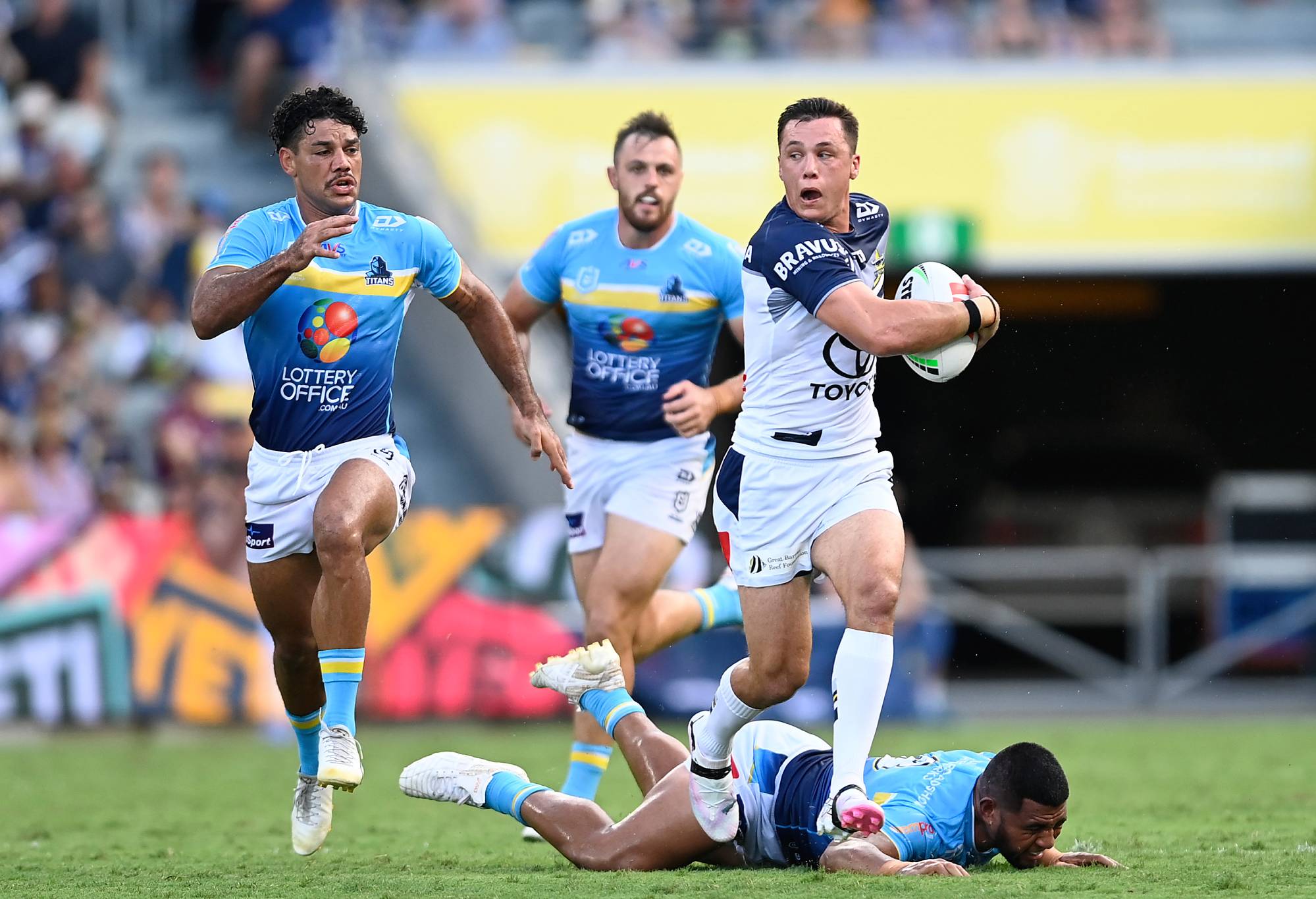 TOWNSVILLE, AUSTRALIA - APRIL 07: Scott Drinkwater of the Cowboys makes a breakduring the round five NRL match between North Queensland Cowboys and Gold Coast Titans at Qld Country Bank Stadium, on April 07, 2024, in Townsville, Australia. (Photo by Ian Hitchcock/Getty Images)