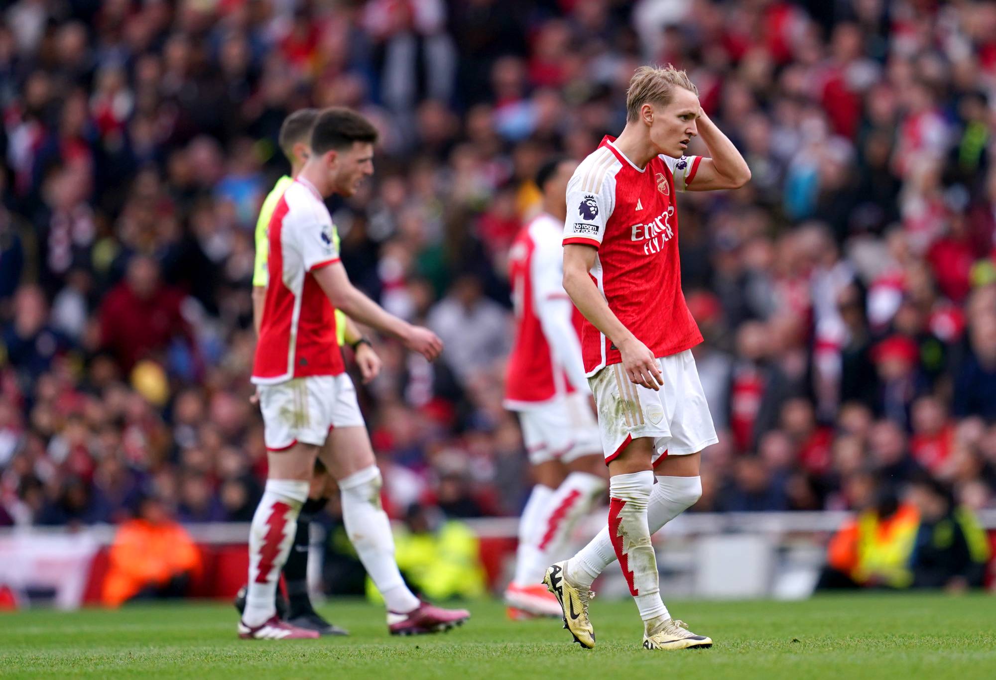Arsenal's Martin Odegaard (right) appears dejected during the Premier League match at the Emirates Stadium, London. Picture date: Sunday April 14, 2024. (Photo by Adam Davy/PA Images via Getty Images)
