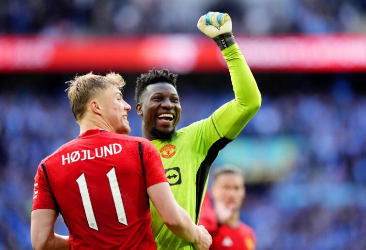 Manchester United's Rasmus Hojlund (left) and goalkeeper Andre Onana celebrate at the end of the Emirates FA Cup semi-final match at Wembley Stadium, London. Picture date: Sunday April 21, 2024. (Photo by Nick Potts/PA Images via Getty Images)