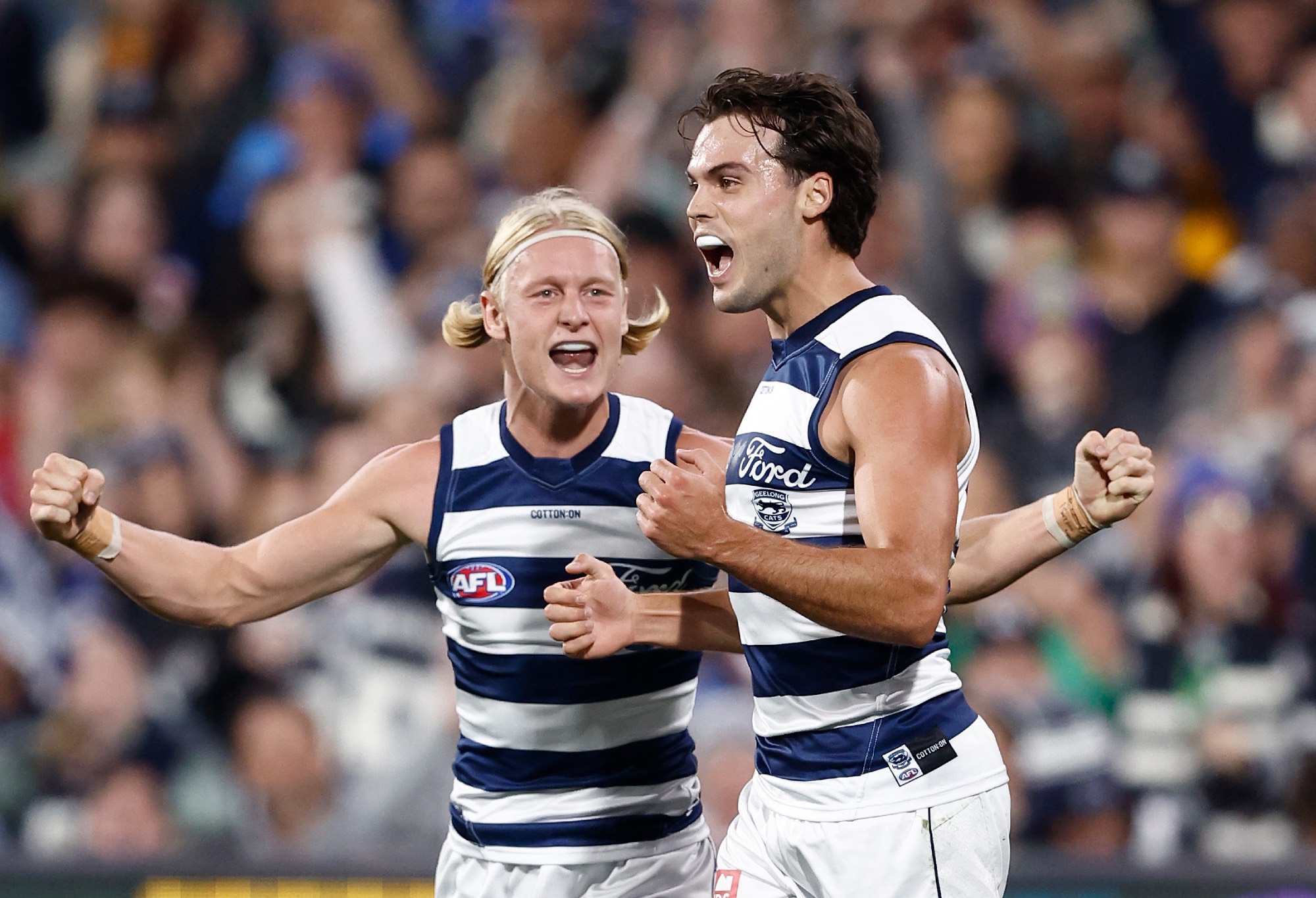  Oliver Dempsey (left) and Jack Bowes of the Cats celebrate during the 2024 AFL Round 04 match between the Western Bulldogs and the Geelong Cats at Adelaide Oval on April 06, 2024 in Adelaide, Australia. (Photo by Michael Willson/AFL Photos via Getty Images)
