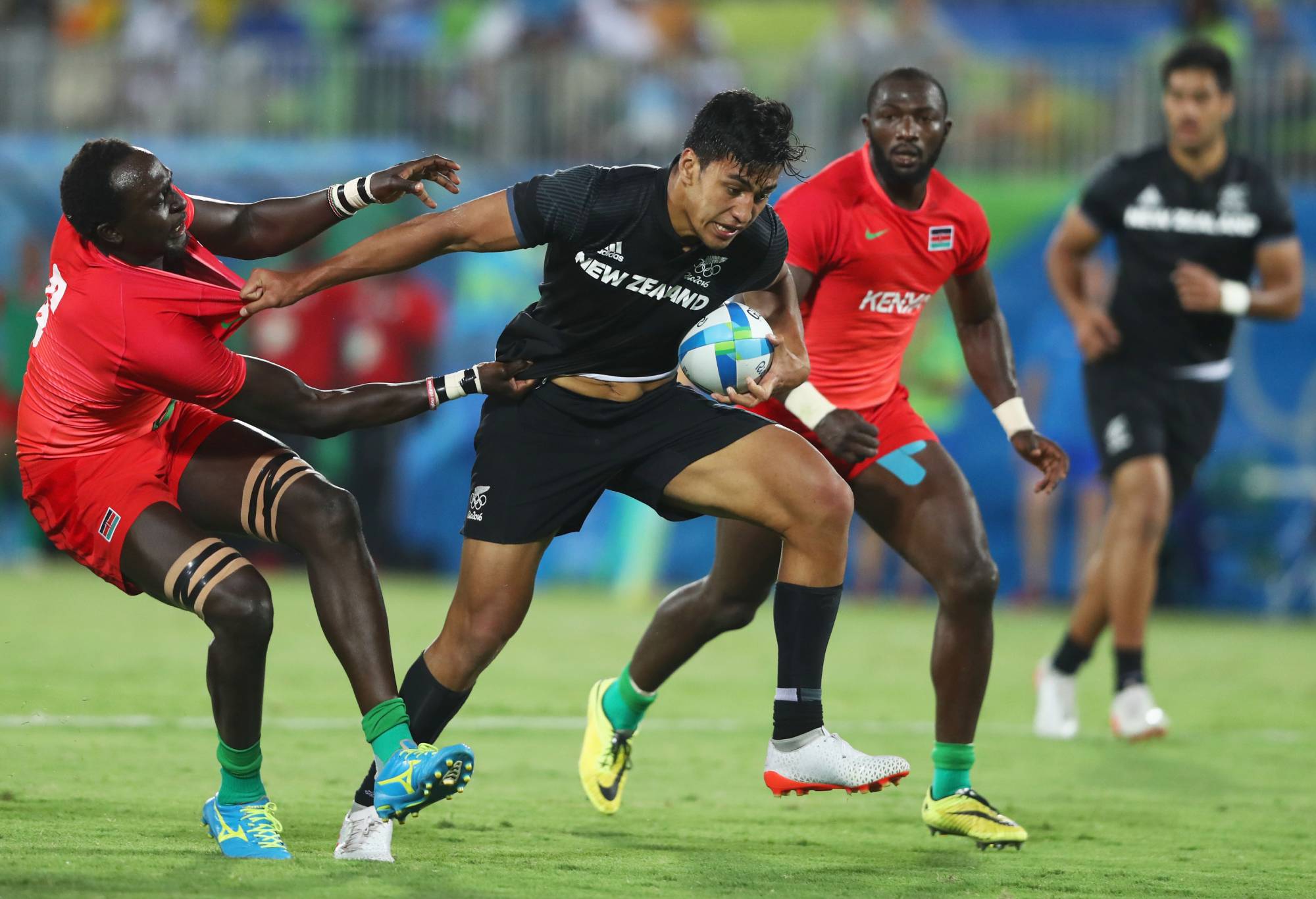  Rieko Ioane of New Zealand holds off Humphrey Kayange of Kenya during the Men's Rugby Sevens Pool C match between New Zealand and Kenya on Day 4 of the Rio 2016 Olympic Games at Deodoro Stadium on August 9, 2016 in Rio de Janeiro, Brazil. (Photo by David Rogers/Getty Images)