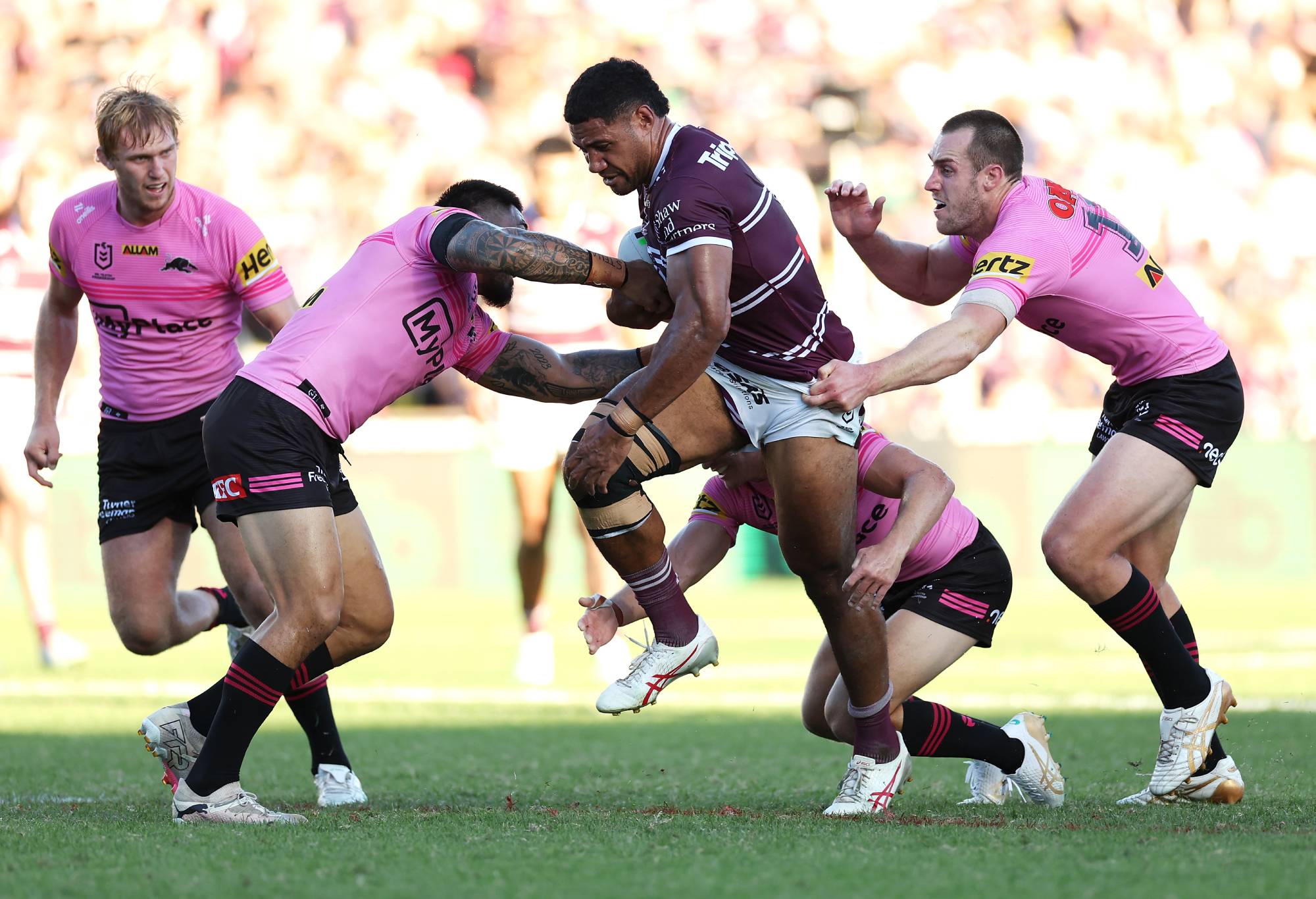 SYDNEY, AUSTRALIA - APRIL 06: Taniela Paseka of the Sea Eagles is tackled during the round five NRL match between Manly Sea Eagles and Penrith Panthers at 4 Pines Park, on April 06, 2024, in Sydney, Australia.