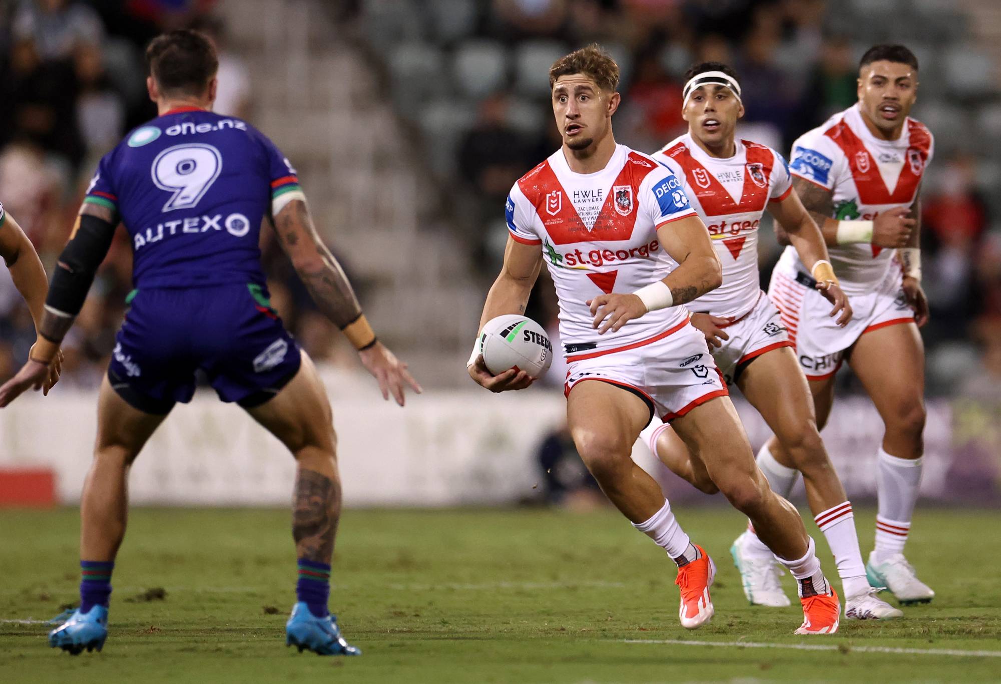 WOLLONGONG, AUSTRALIA - APRIL 19: Zac Lomax of the Dragons runs the ball during the round seven NRL match between St George Illawarra Dragons and New Zealand Warriors at WIN Stadium on April 19, 2024, in Wollongong, Australia.