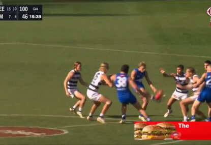 WATCH: Young Roo goes full North, kicks the wrong way from centre bounce!