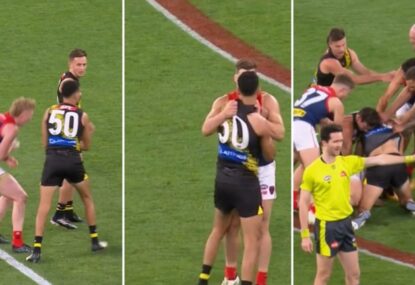 Marlion Pickett gut-punches Oliver right next to Jack Viney, melee obviously ensues