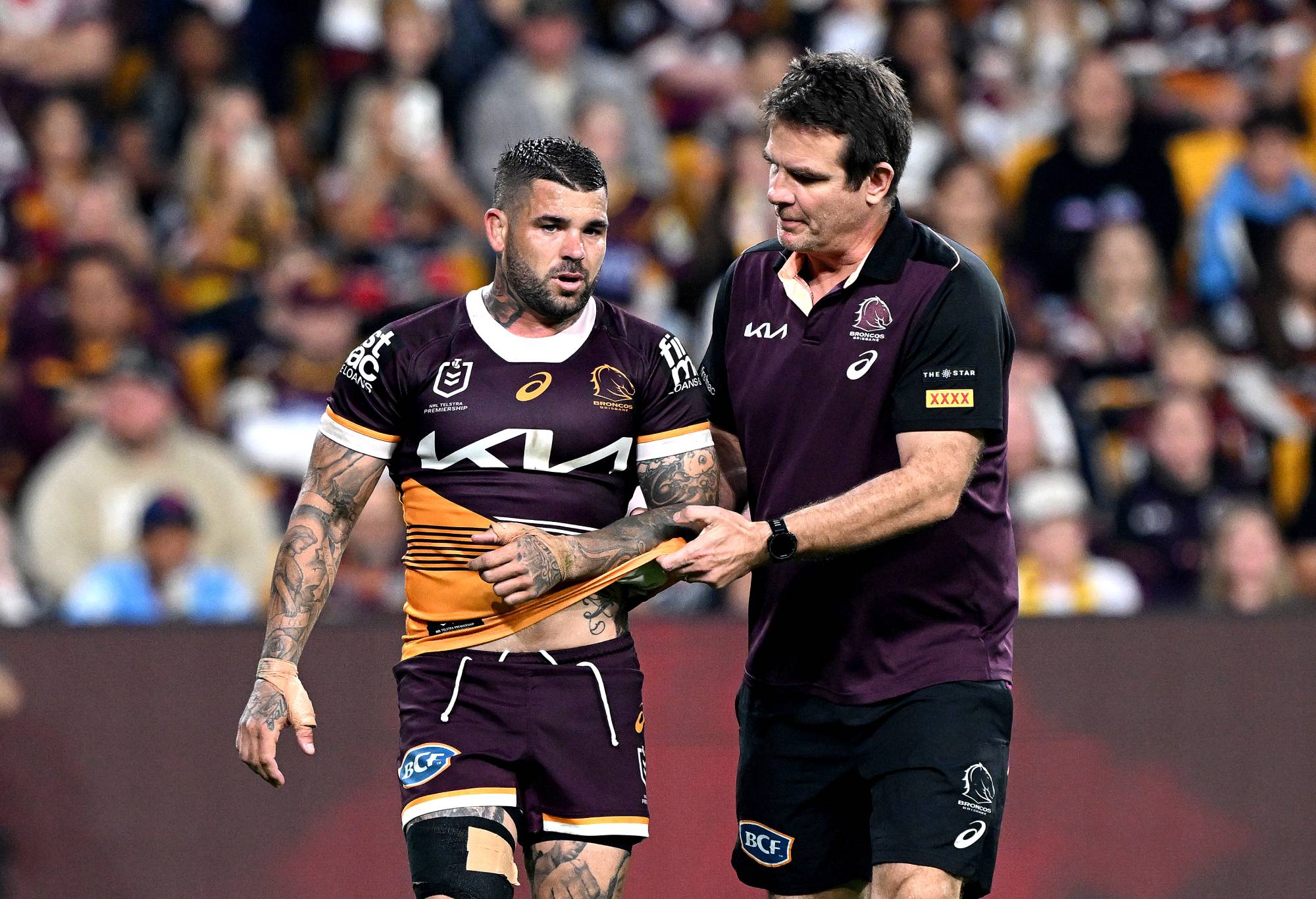 BRISBANE, AUSTRALIA - MAY 03: Adam Reynolds of the Broncos is injured during the round nine NRL match between the Brisbane Broncos and Sydney Roosters at Suncorp Stadium, on May 03, 2024, in Brisbane, Australia. (Photo by Bradley Kanaris/Getty Images)