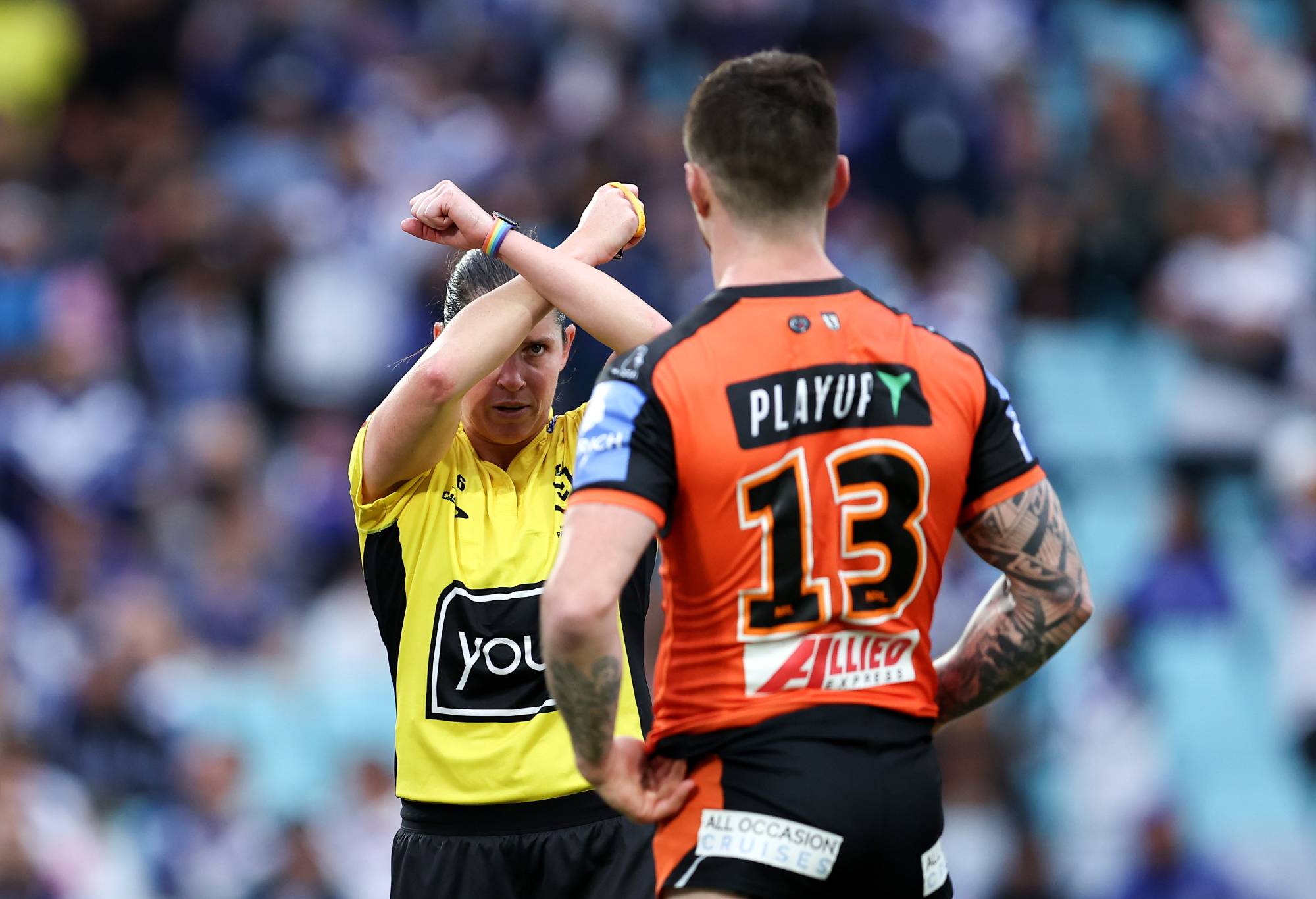 SYDNEY, AUSTRALIA - MAY 04: Aidan Sezer of the Tigers is placed on report by referee, Kasey Badger during the round nine NRL match between Canterbury Bulldogs and Wests Tigers at Accor Stadium, on May 04, 2024, in Sydney, Australia. (Photo by Brendon Thorne/Getty Images)