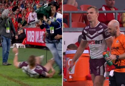 WATCH: Tom Trbojevic's game ends early after a collision with cameraman trying to stop try