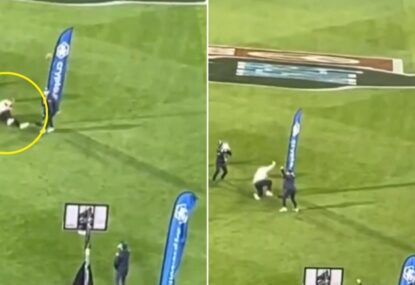 WATCH: Crows fan slips over mid-kick, still gets a swish to win competition!