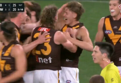 WATCH: Wholesome scenes as Hawks swarm debutant Calsher Dear after first AFL goal