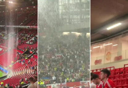 LANGUAGE: Heavy rain causes flooding at Old Trafford as Arsenal sends title race to the wire